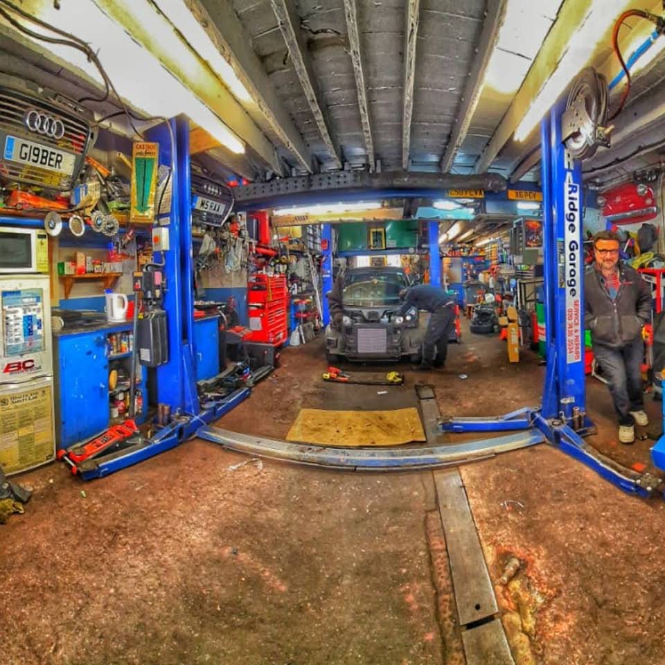 Inside the Ridge Garage workshop with two lifts